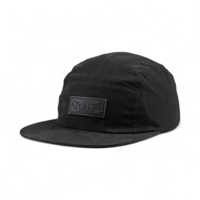 Image of the back of a black Camper Hat with a black webbing with plastic clip and the US flag on it