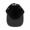 Image of the back of a black Camper Hat with a black webbing with plastic clip and the US flag on it