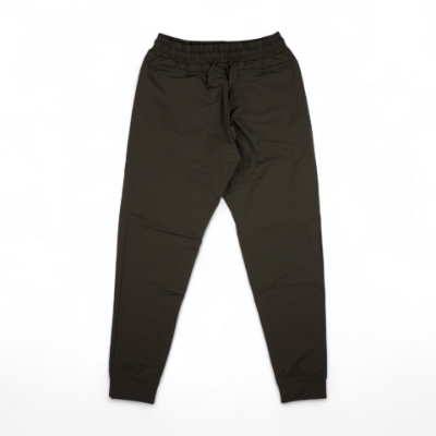 Front view of Carrier Traveler Joggers with drawstring waist, zipper fly, and clean tactical design