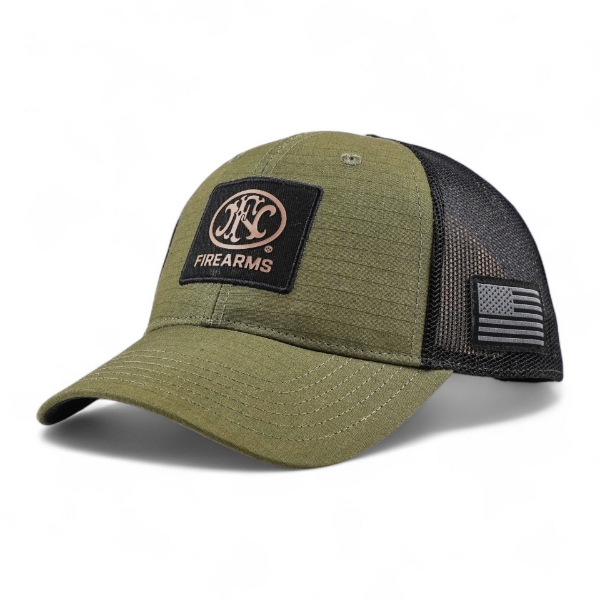 Side view of olive green trucker hat featuring FNH Firearms patch on front and subdued American flag patch on mesh panel.