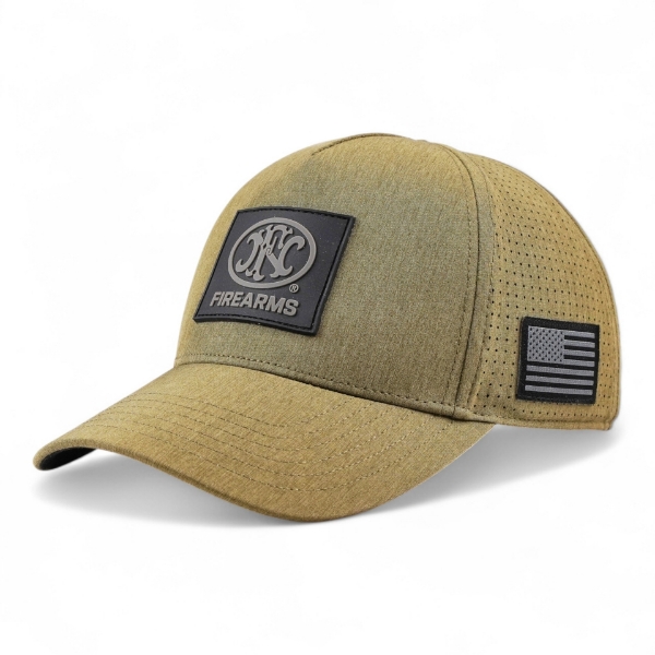 Three-quarter front view of tan perforated cap showing FNH Firearms patch and American flag patch on side.